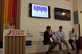 Carlos Moure from Kairos, David Moreno from Coowry, and Juan Caballero from IMDEA Software during the panel discussion